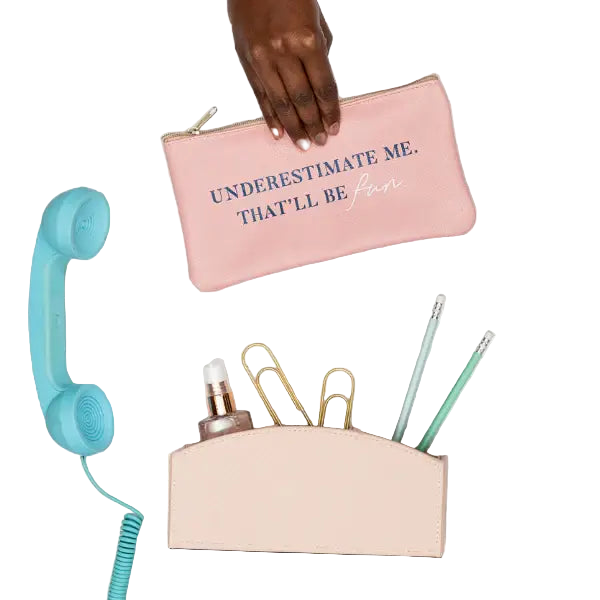 Pink pouch with text, hand holding it, and office supplies on a light background