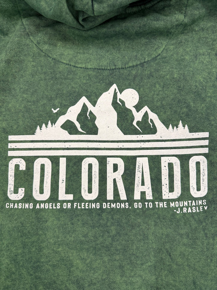 Green sweatshirt with white graphic and text on a green background